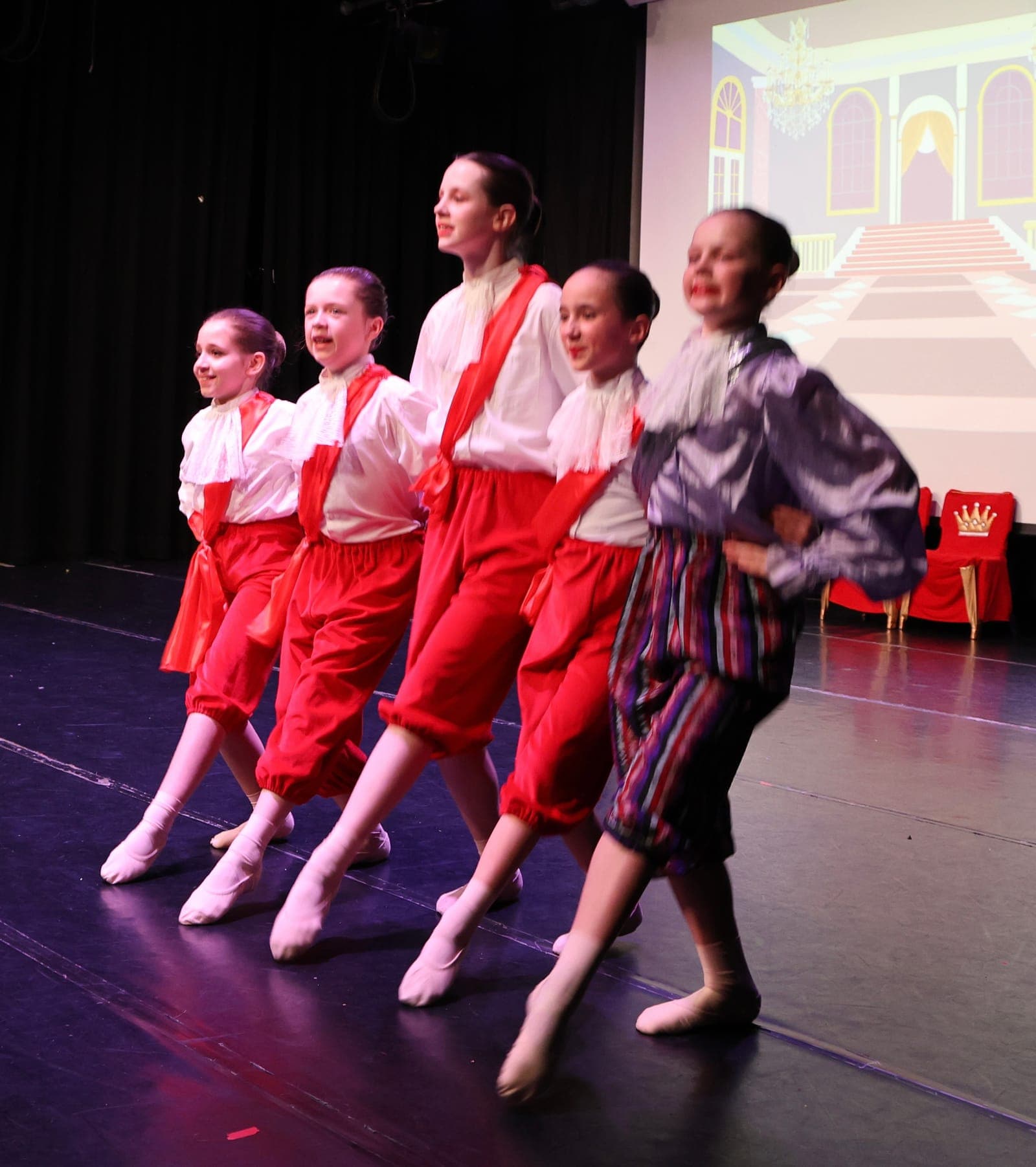GLDS dancers in character costumes on stage
