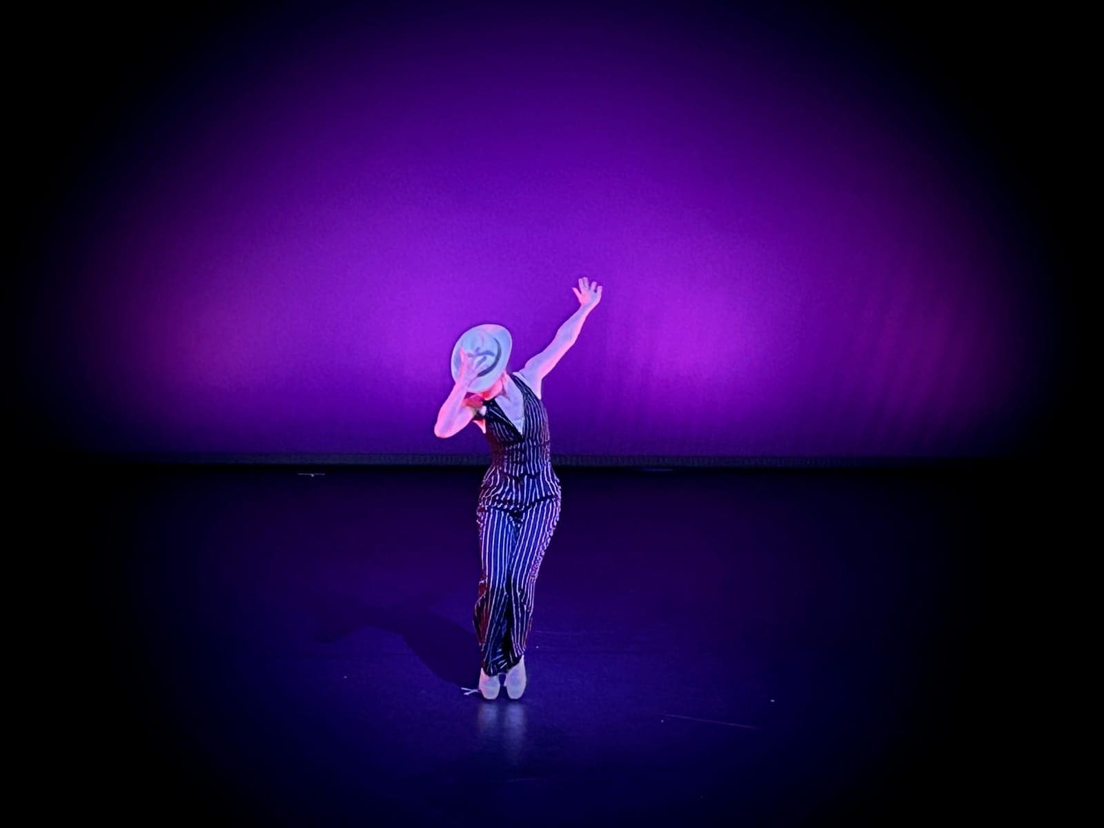 Jazz dancer in the spotlight at a Geraldine Lamb show in Plymouth