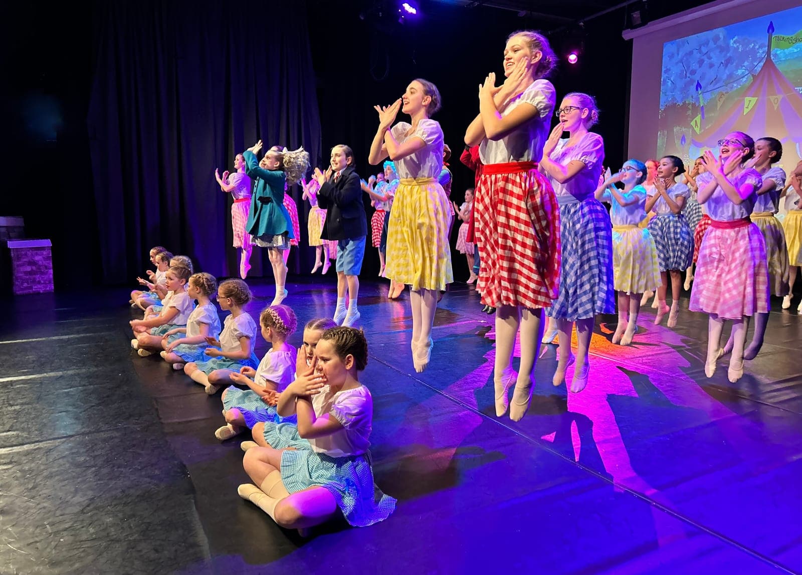 Musical theatre dancers in a circus-themed number